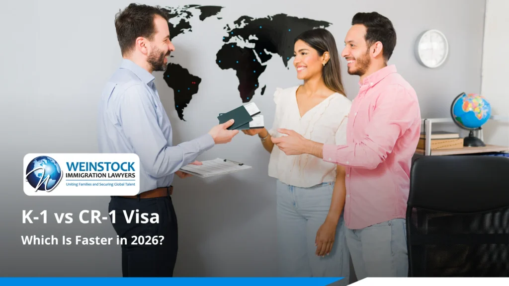 Couple receiving passports from an immigration attorney while comparing K-1 vs CR-1 visa options